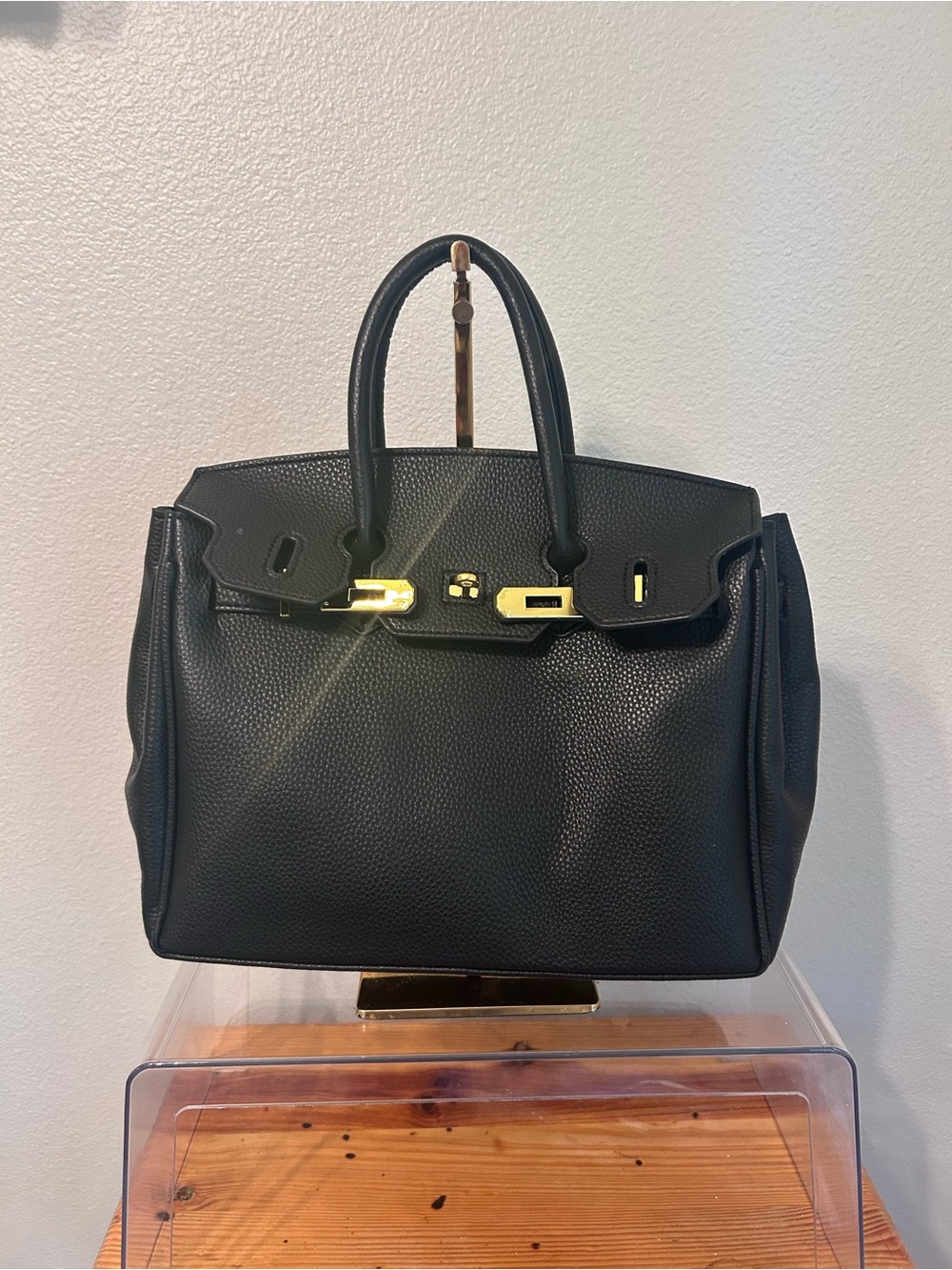 Elegant Black Pebbled Satchel with Gold-Tone Hardware